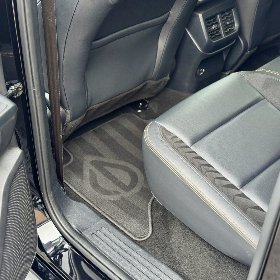 Logo set into the rear mat of a Ford Ranger